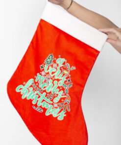 Festive Christmas stocking adorned with intricate embroidery and plush trim, perfect for holiday mantel decor.